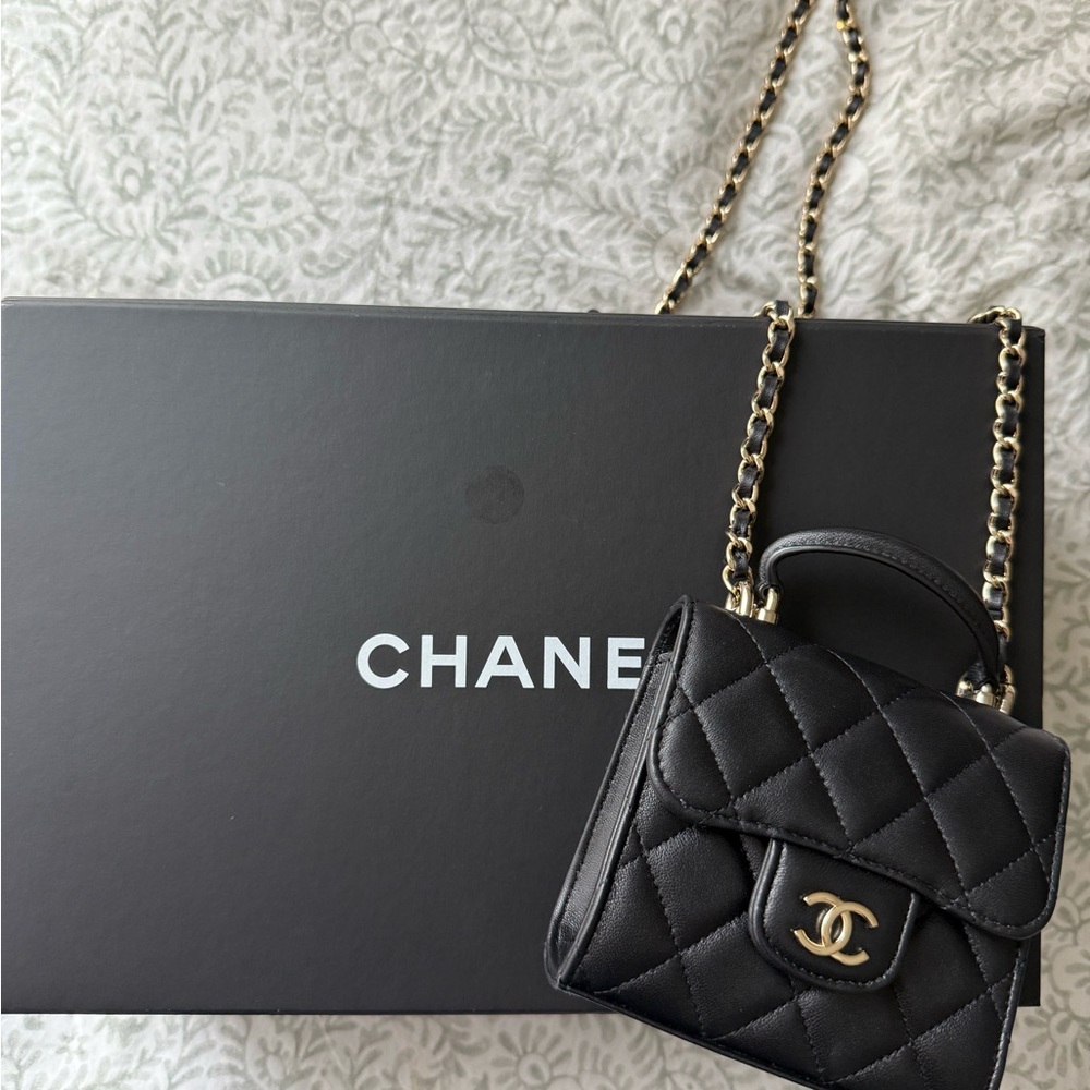 Chanel (mini top handle) Black Quilted Leather Bag